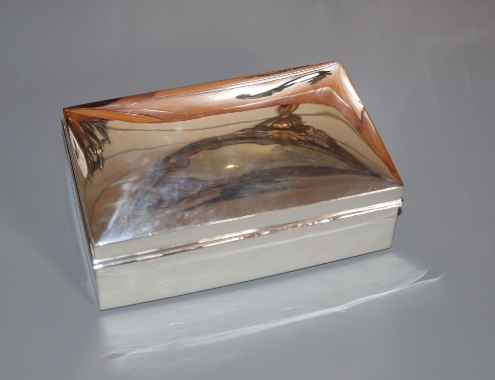 A George V silver mounted cigarette box by Walker & Hall, Birmingham, 1924, 14.2cm, gross 17.5 oz.